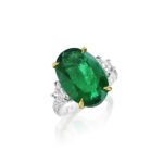 Oval Emerald with Trapezoid and Round Diamond Ring