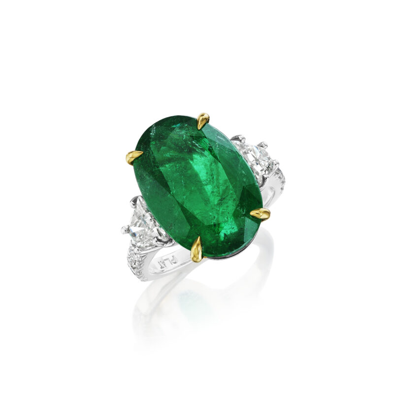 Oval Emerald with Trapezoid and Round Diamond Ring
