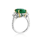 Oval Emerald with Trapezoid and Round Diamond Ring