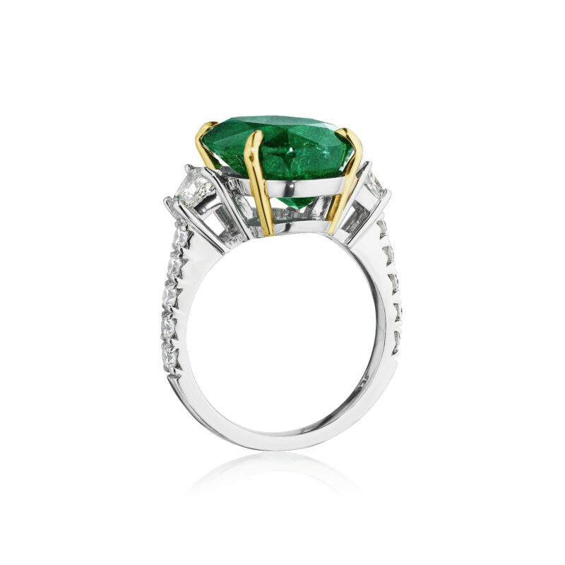 Oval Emerald with Trapezoid and Round Diamond Ring